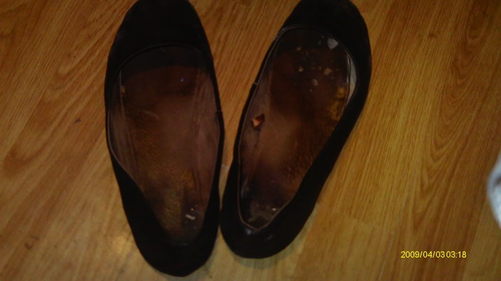 well worn trashed shoes