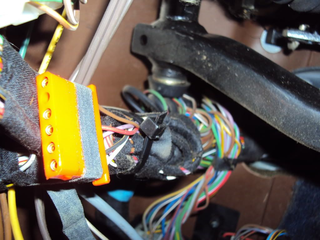 Random wires hanging under steering wheel