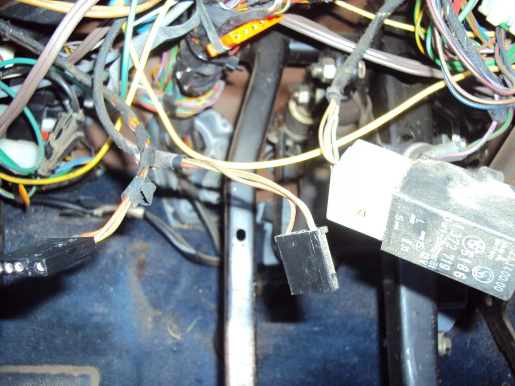 Random wires hanging under steering wheel